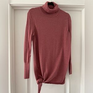 Cozy pink maternity turtleneck sweater